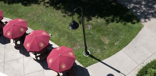 campus arial of tables and umbrellas