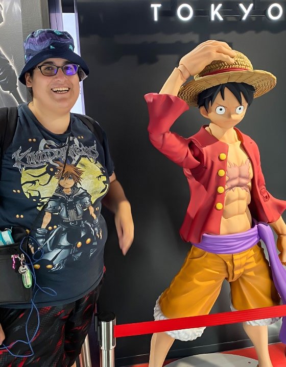 Thalia Guardarrama stands next to 3-D anime character