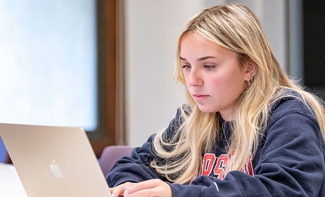 Student working at laptop