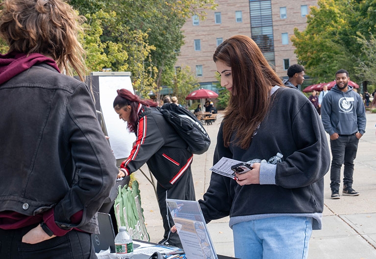Student at table at fresh check day