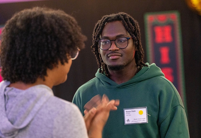 Students talking at black history month celebration