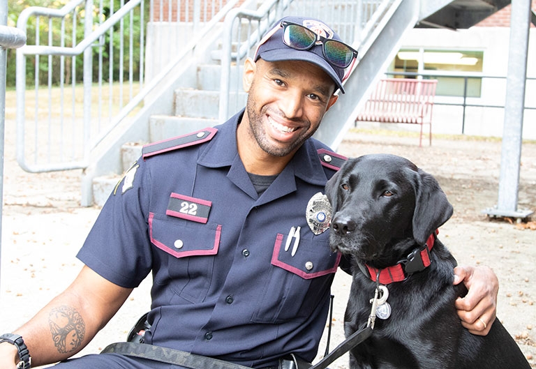 Campus Police dog, Elvy, and Officer Coleman