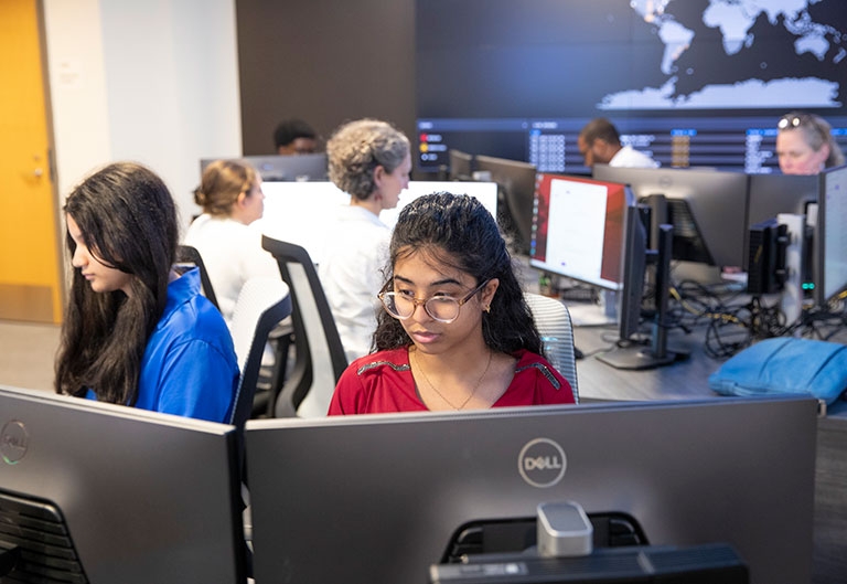 Students working in cyber range