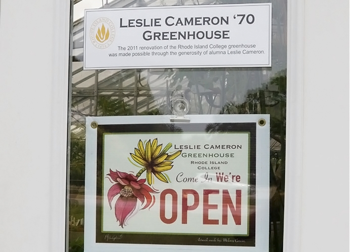 Open sign on greenhouse door
