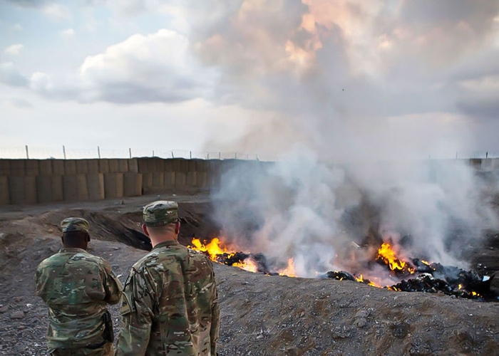 Smoldering burn pit on army base