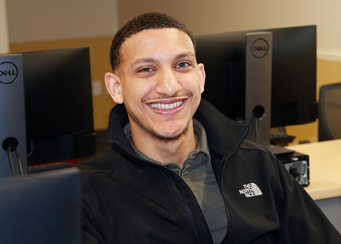 Head shot of Frederick Torres in computer lab