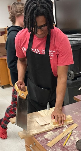 Tavell Johnson in woodworking lab