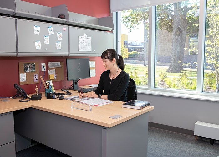 Physical Sciences faculty member in new office in Clarke Science