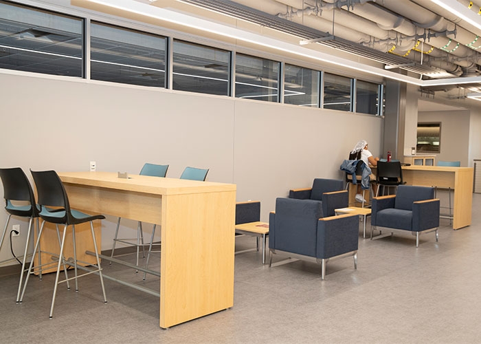 Collaboration space for students with desks and chairs