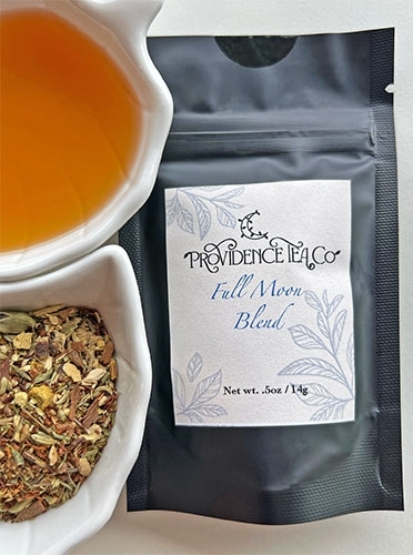 bowl of tea, tea leaves, and bag of tea leaves from Providence Tea Company