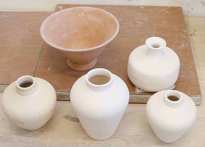 Five unfinished pottery pieces by Liping Zhang