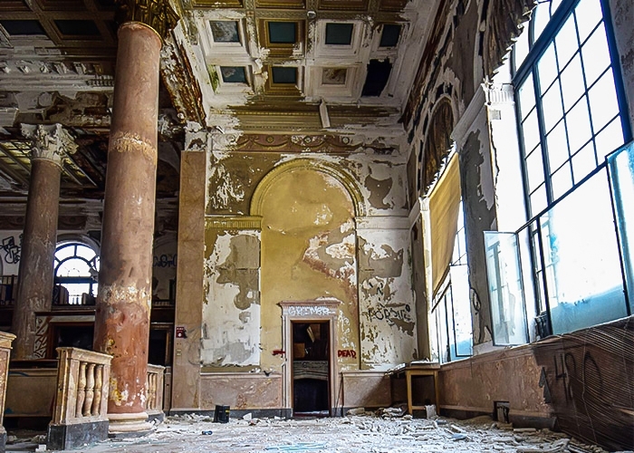 Photograph by Simone Emerich, "Empty Bank" of an abandoned dilapidated bank interior