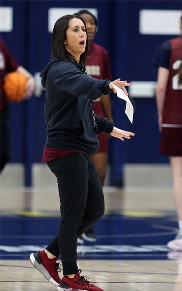 Coach Jennifer Cosgrove on the basketball court