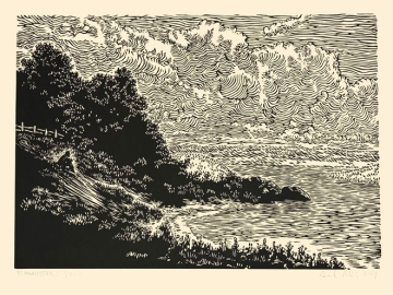 Linocut print featuring a landscape with a man sitting on the coastline