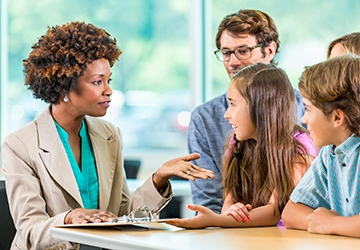 Child and family advocate working with a family