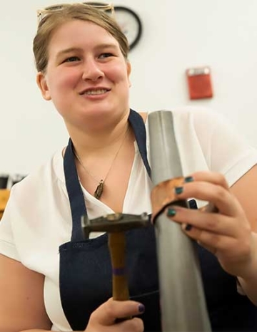 Greer Howard working on jewelry