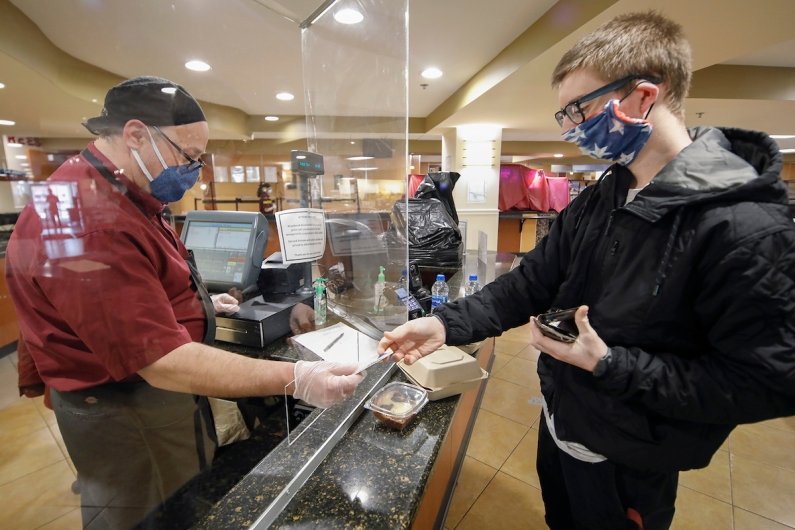 student purchasing food in Donovan Dining Center