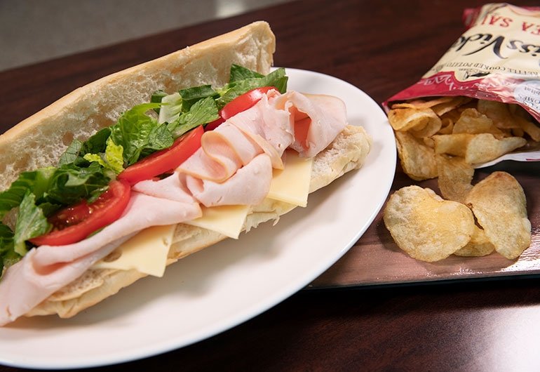 Sandwich with a side of chips from Donovan Dining Center