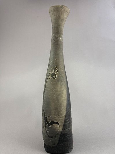 Ceramic vase-like sculpture featured in 3D faculty exhibition