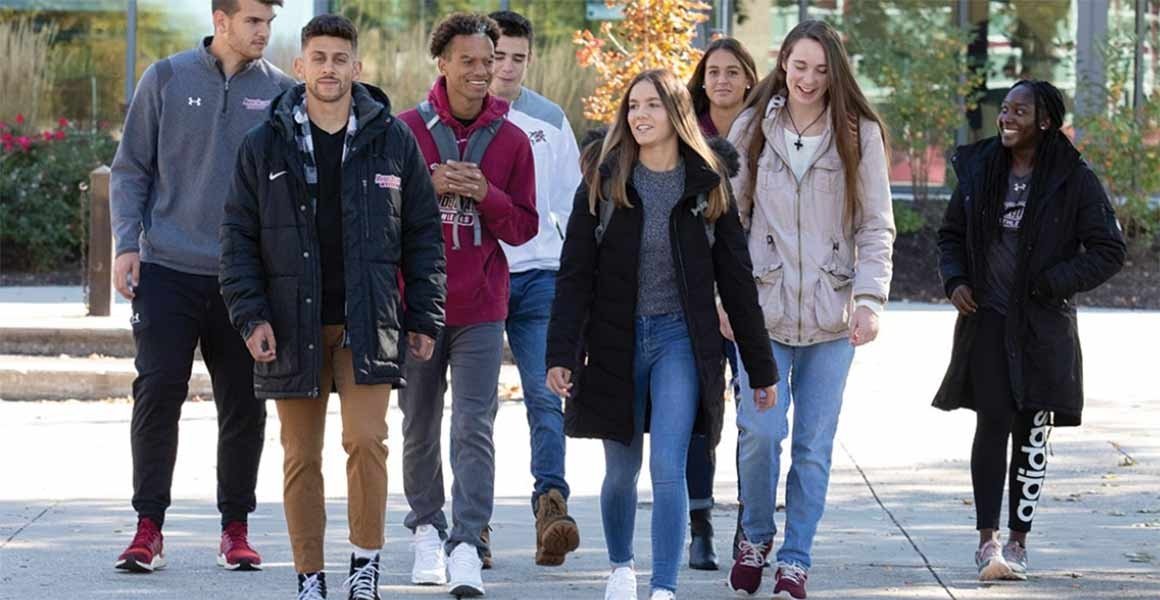 Group of students walking on campus