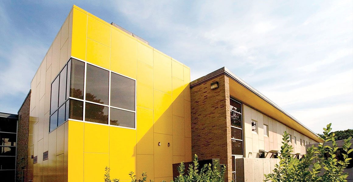 Alger Hall exterior, focused on yellow portion of building