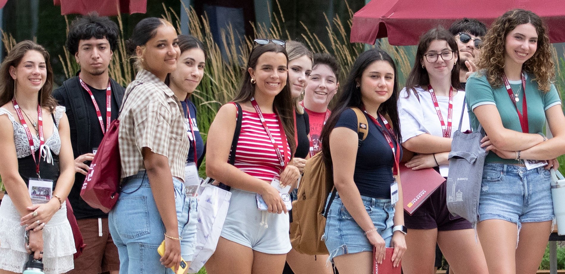 Smiling group of students on quad at orientation