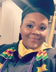 RIC alumna Randia Dickerson in her cap and gown