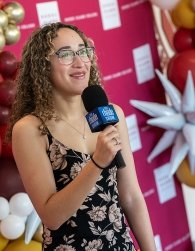 College tour student cast member speaking to the Rhode Show