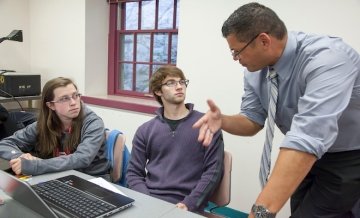 Nonprofit studies students in discussion with instructor