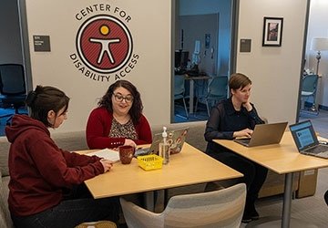 People working in the Center for Disability Access