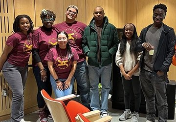 Students in Unity Center t-shirts with Harambee E-Board members
