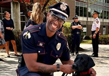 Officer Coleman with police dog Elvy