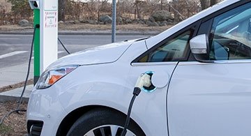 Electric vehicle plugged in