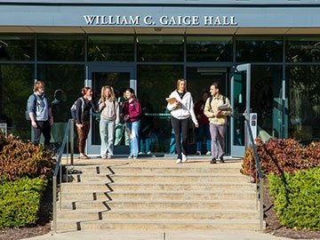 Students walking down steps of Gaige Hall