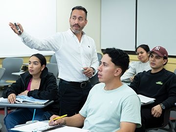 Jhon Cardona teaching ESL class at the Workforce Development Hub