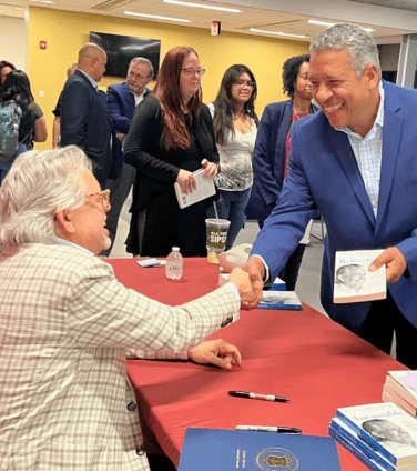 Person shaking author's hand
