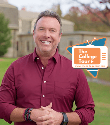 Alex Boylan, College Tour Host, in front of Forman Building with College Tour logo