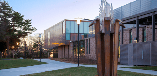 Alex and ani building with RIC flame sculpture 