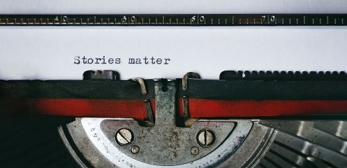 Typewriter writes "stories matter"