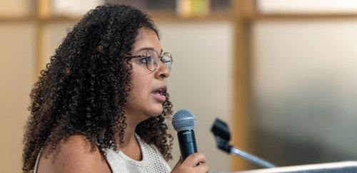 Joise Garzon at microphone