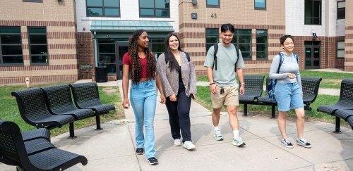 Students walking out of Penfield Hall