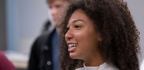 Smiling student in classroom