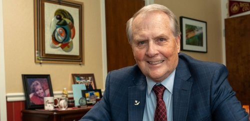 President Jack R. Warner in his office