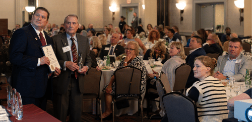 President Warner and audience at the Alumni Awards Ceremony