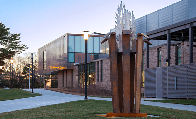 Alex and ani building with RIC flame sculpture 