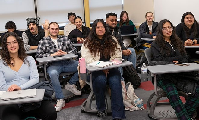 Students sitting at desks in class