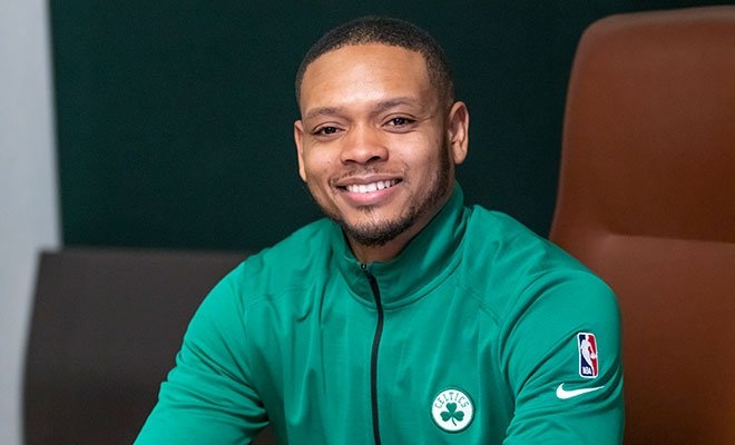 Jonathan Robinson, alum, in Celtics attire