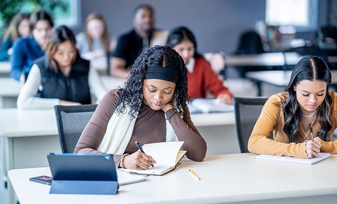 High school student working hard in class