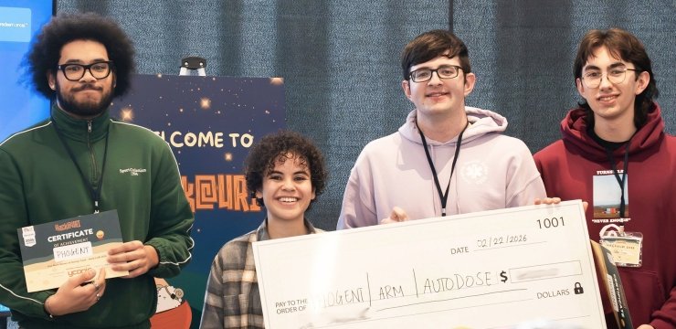 Four hackathon winners at AI competition holding giant check